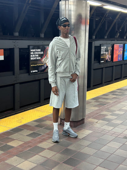 Soe.Alpha wearing the Grey Century Boy Zip-Hoodie with the Shorts and Century Bally. Not too many of the mandem can do it like that....